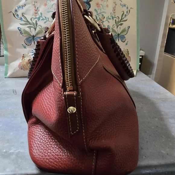 Beautiful red leather Dooney & Bourke purse with crossbody option